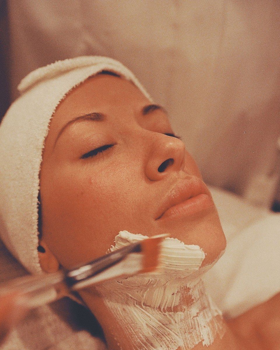 A mask brushed on during a facial