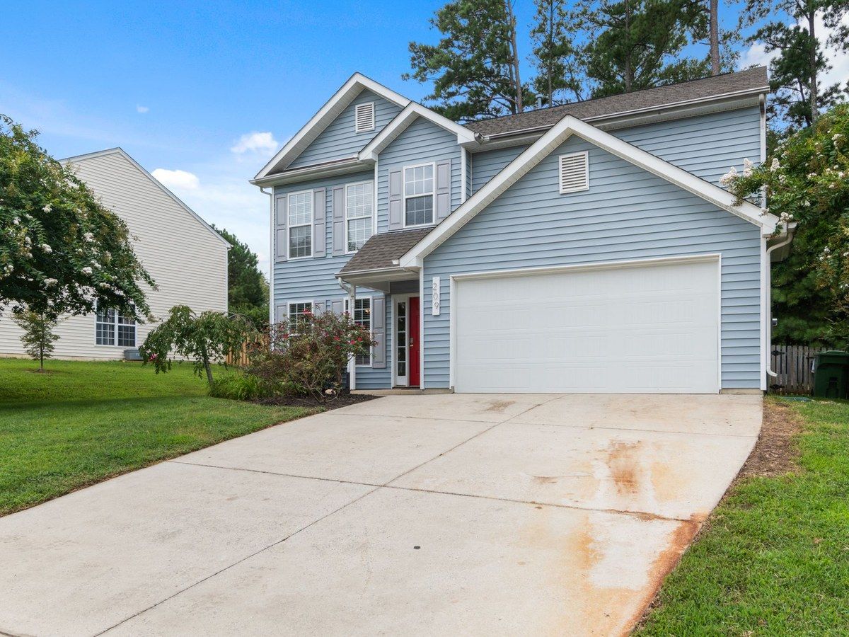 A house with blue vinyl siding