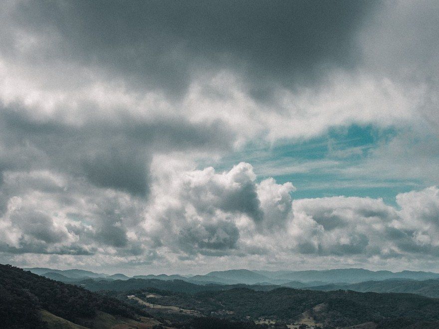 Storm clouds building over the hills